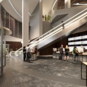 Hall d'entrée de bureau moderne avec une entrée en verre incurvé, des bureaux de réception et des personnes debout et en interaction. Le design élégant et contemporain comprend un grand écran numérique sur le mur et un escalator menant à un niveau supérieur où davantage de personnes sont visibles.
